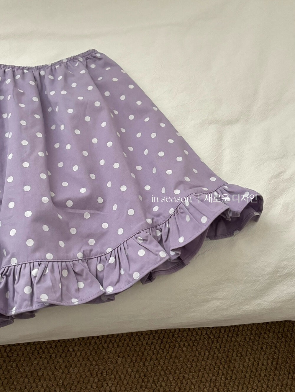 Purple ruffled polka dot skirt