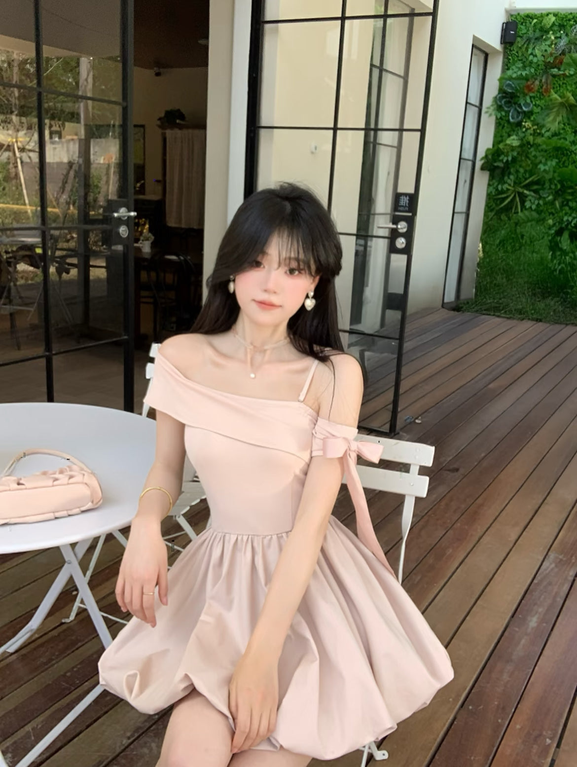 Pink irregular off-shoulder bud dress
