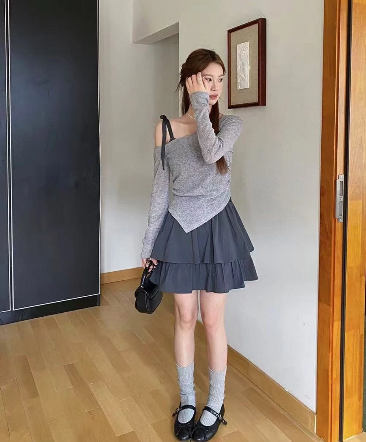 Ballet style two-piece set with a suspender skirt inside and a shoulder-baring blouse outside