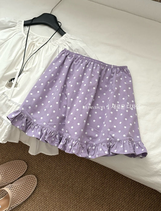 Purple ruffled polka dot skirt